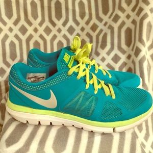 Turquoise and lime green Nike sneakers